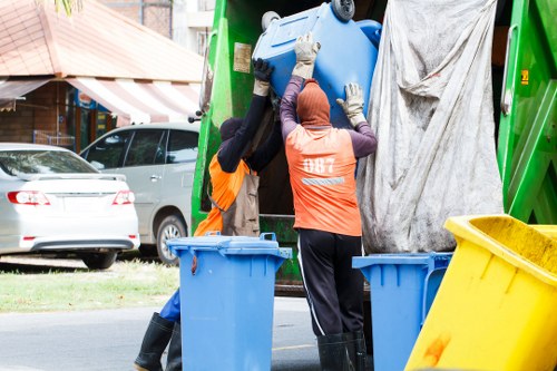 Workers segregating construction waste