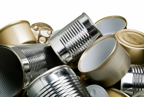 Crew delivering a skip to a Georgian townhouse in Covent Garden