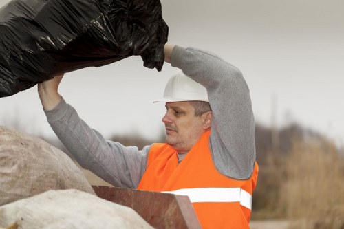 Different types of waste loaded into a skip